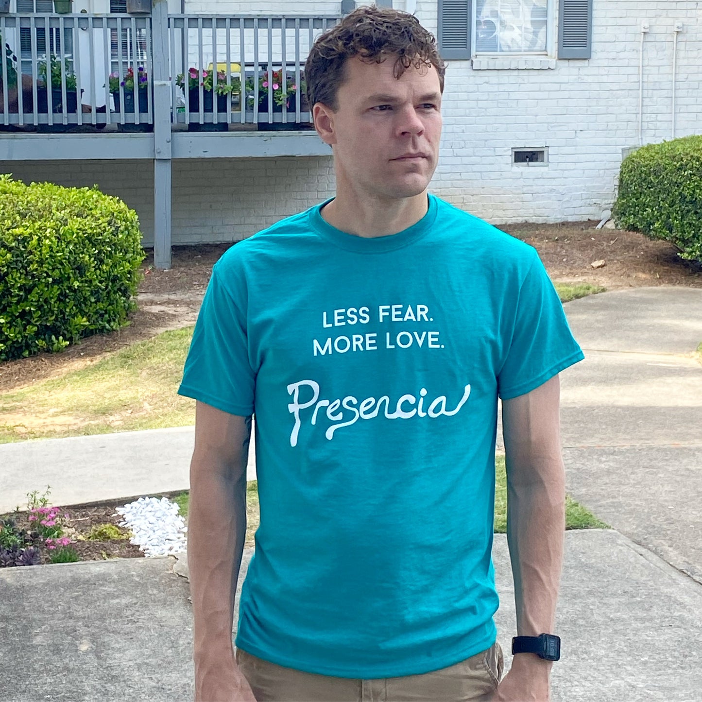Less Fear. More Love. Unisex T-Shirt.